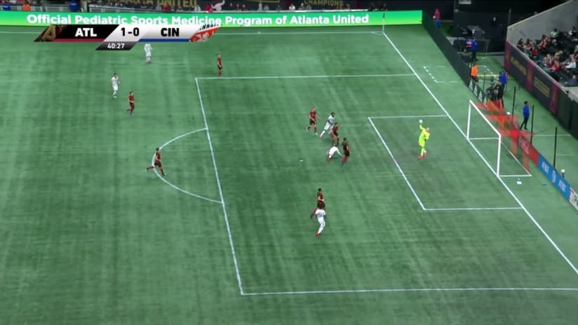 SAVE: Brad Guzan fights off an Allan Cruz header