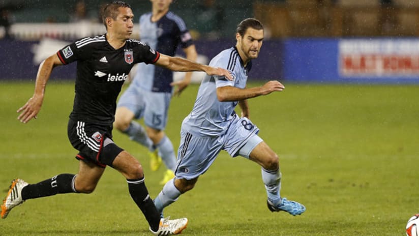 Davy Arnaud (D.C. United) and Graham Zusi (Sporting KC)