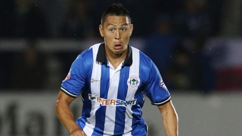 Roger Espinoza playing for Wigan Athletic