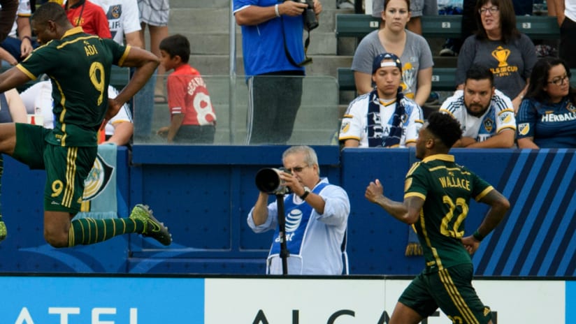 Fanendo Adi flies high to celebrate penalty kick goal against LA Galaxy