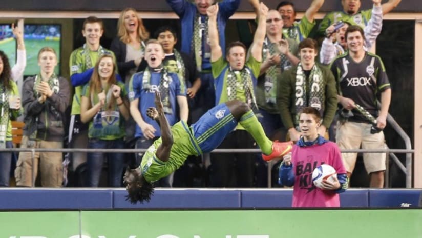 Obafemi Martins flips after scoring in Seattle Sounders match vs. New England Revolution