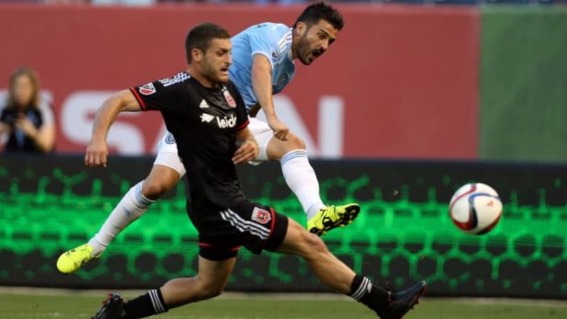 Chris Korb (DC United) attempts to block David Villa's (NYCFC's) shot