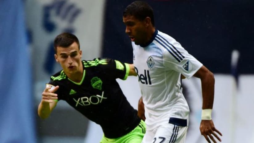 Aaron Kovar (Seattle Sounders) battles with Ethen Sampson (Vancouver Whitecaps)