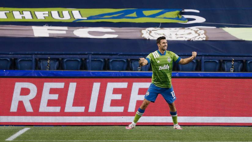 Will Bruin - Seattle Sounders - celebrates in front of tarped seats - for home-field advantage piece