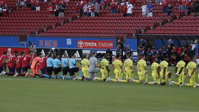 FC Dallas - Nashville SC - players keeling anthem