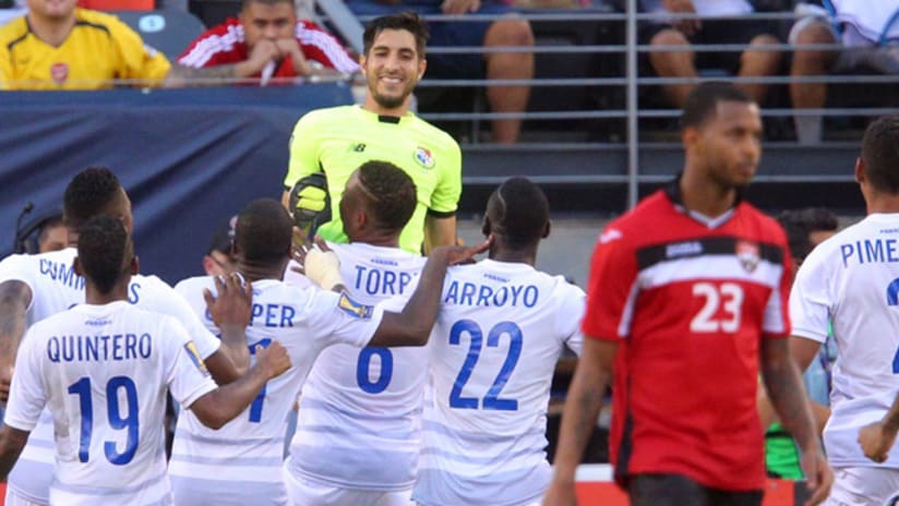 Panama mob Jaime Penedo after their shootout win over Trinidad & Tobago