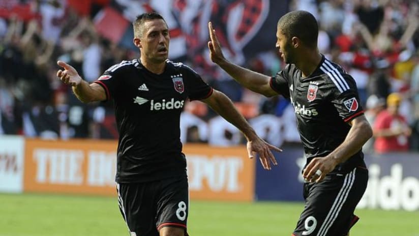 DC United's Alvaro Saborio celebrates first goal with new team with Davy Arnaud