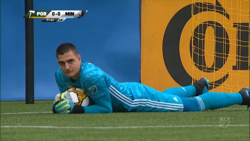 SAVE: Vito Mannone diving stop ensures the clean sheet