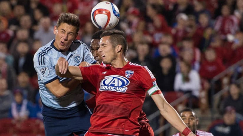 FC Dallas' Matt Hedges heads in traffic during DALvSKC