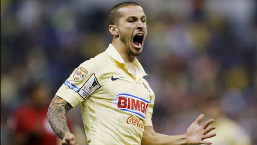 Club America forward Dario Benedetto celebrates after scoring against Herediano