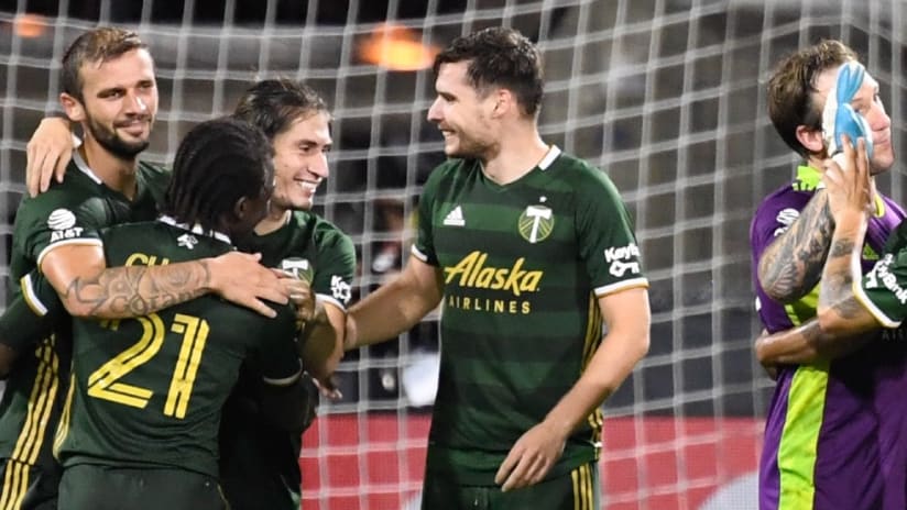 Jaroslaw Niezgoda - Portland teammates - Celebrate