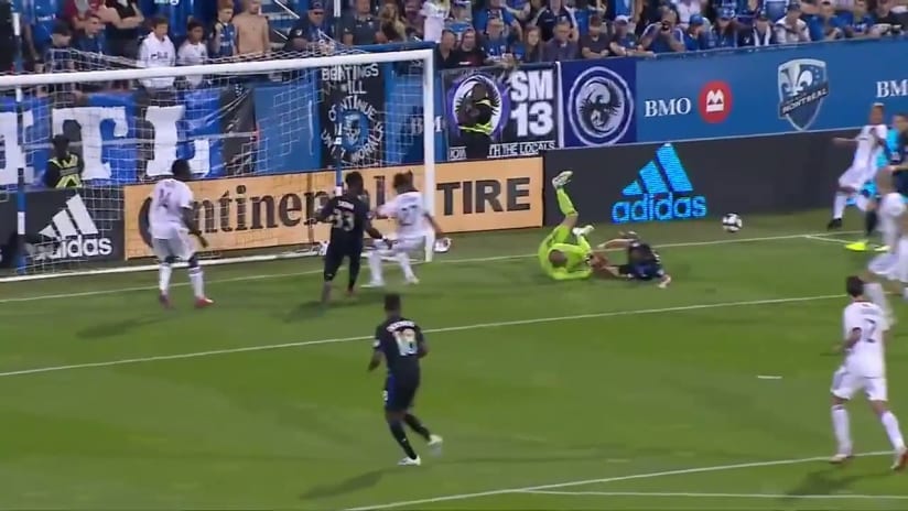 CHANCE: Evan Bush punches away dangerous cross