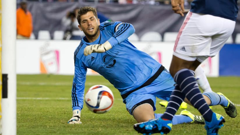 Orlando City FC goalkeeper Tally Hall watches the ball go into the back of the net