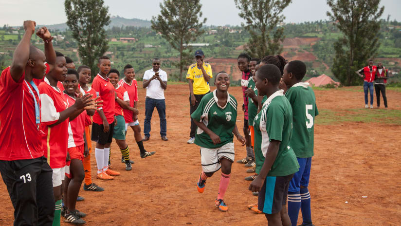 African Road - joy on soccer field