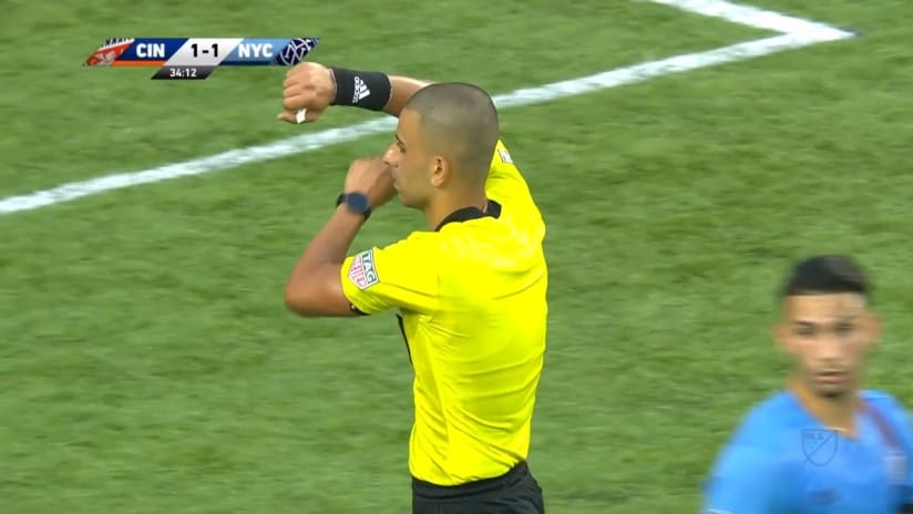 PK FOUL: Andrew Gutman concedes a handball in the box