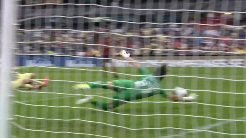 SAVE: Oscar Jimenez makes a great diving save after an excellent Barco run