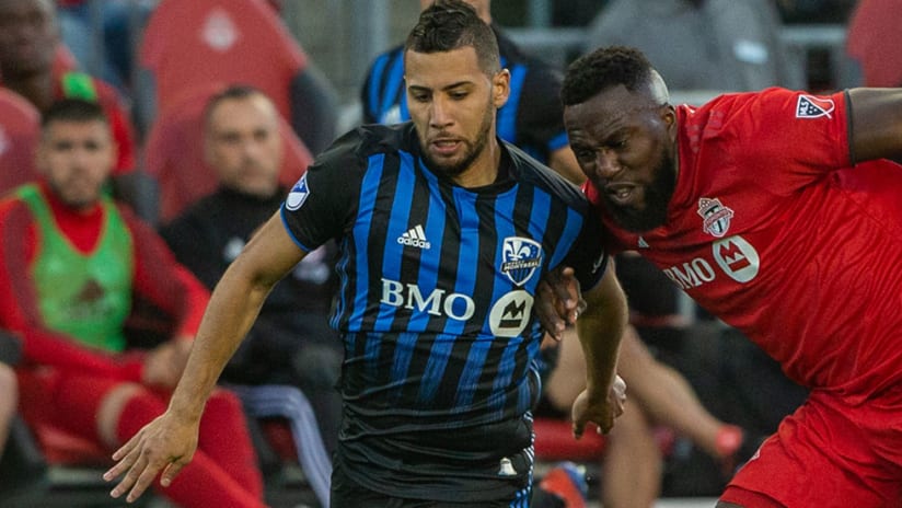 Toronto FC forward Jozy Altidore against Montreal Impact midfielder Saphir Taider