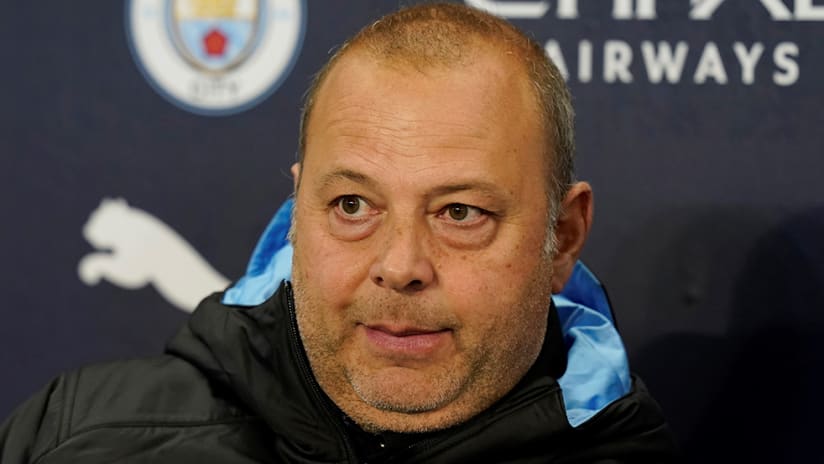 Rodolfo Borrell - Manchester City - sitting on bench