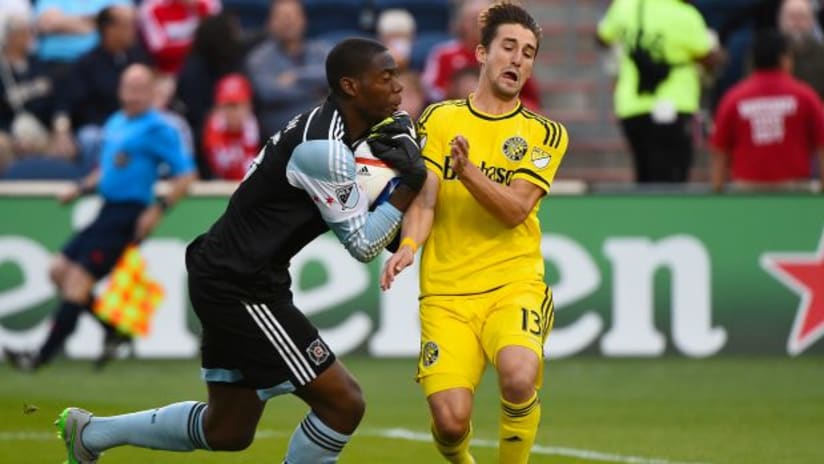 Sean Johnson (Chicago Fire) collides with Ethan Finlay (Columbus Crew SC)