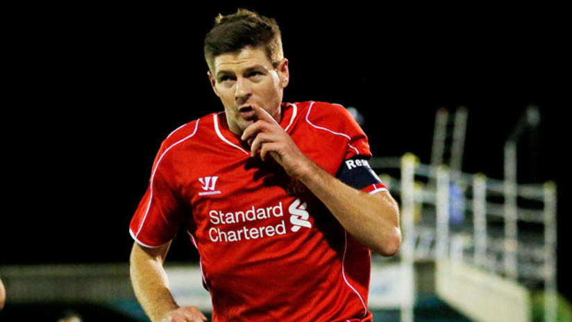 Steven Gerrard celebrates after scoring against AFC Wimbledon in FA Cup