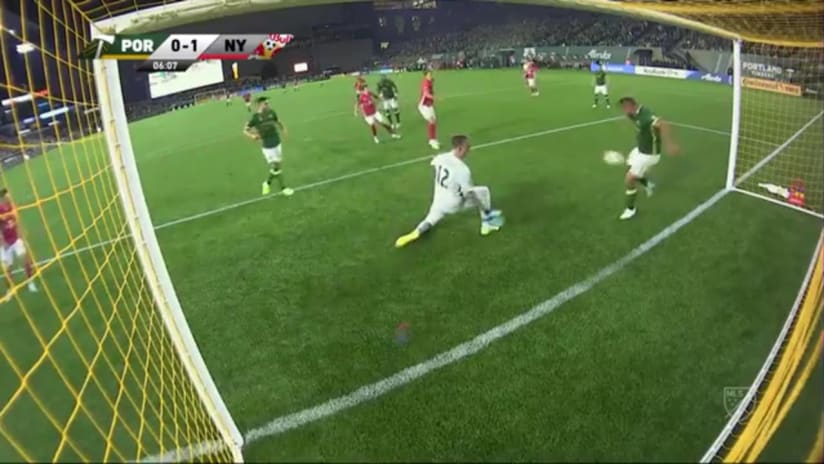 SAVE: A Steve Clark save and follow up goal line clearance keep the Timbers from conceding a second