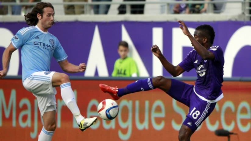 New York City FC's Mix Diskerud challenges Orlando City SC's Kevin Molino