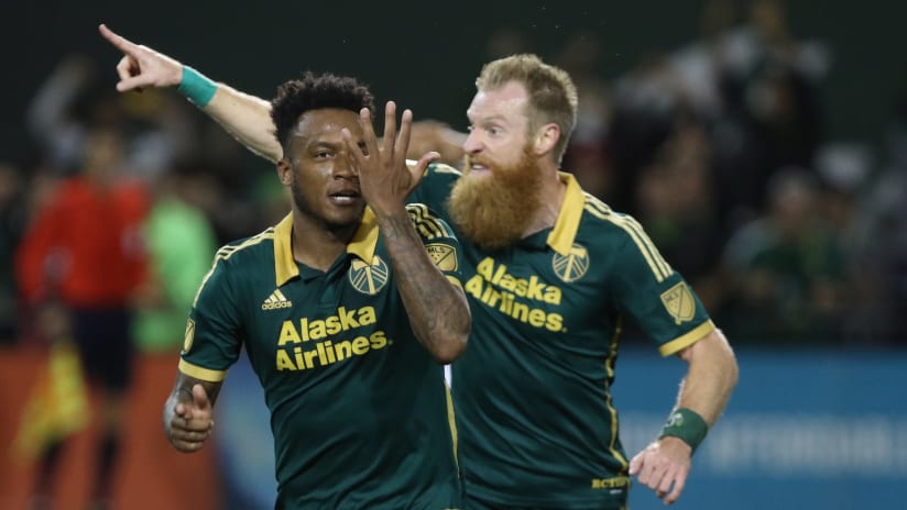 Rodney Wallace and Nat Borchers celebrate Wallace's goal, October 29, 2015