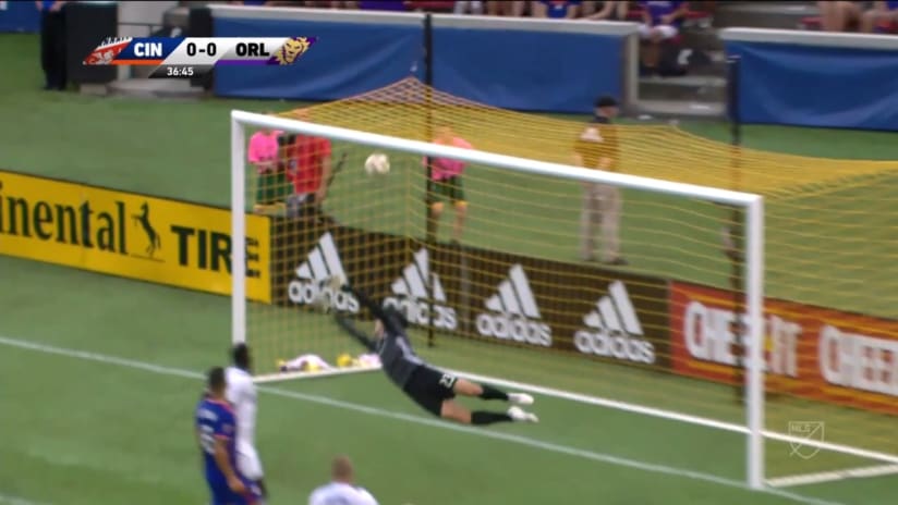 SAVE: Brian Rowe deflects Roland Lamah's shot off the post