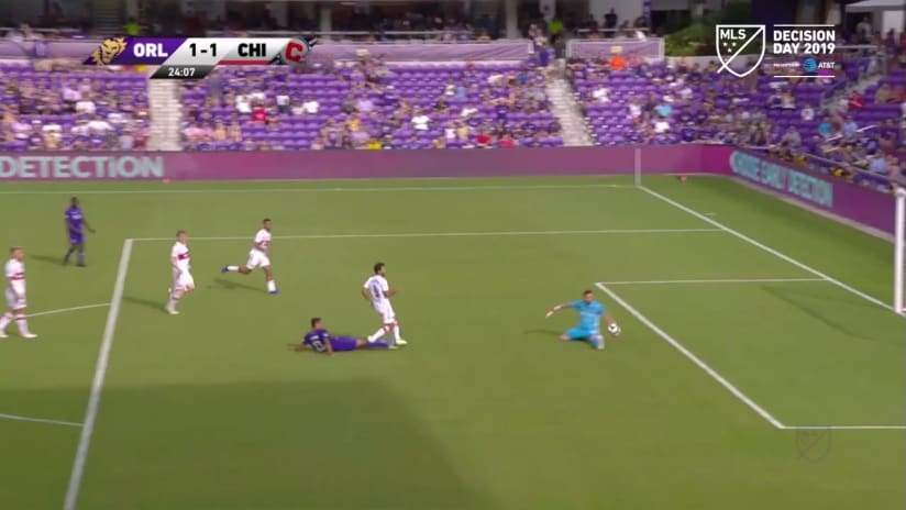 SAVE: Kenneth Kronholm stays in front of Tesho Akindele's effort