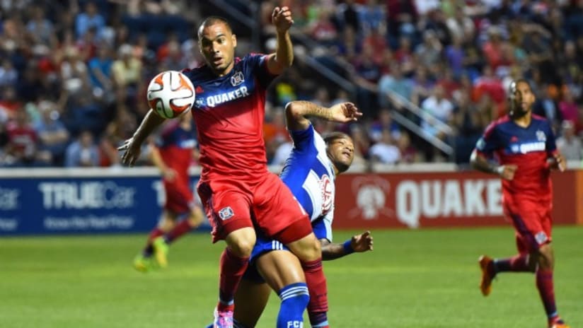 Chicago Fire's Alex outjumps FC Dallas' Andres Escobar at Toyota Park