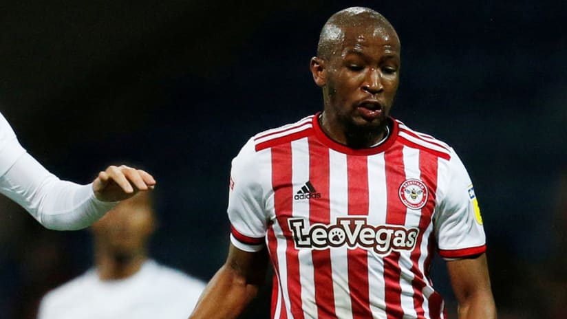 Kamohelo Mokotjo - Brentford - fends off challenge