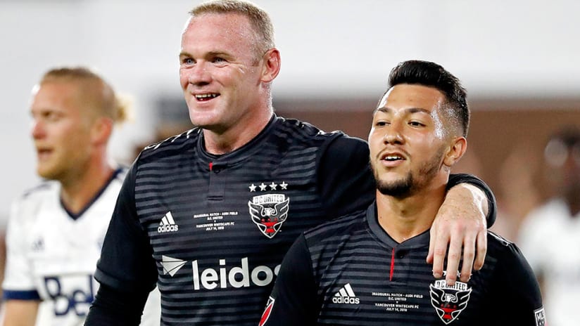 Wayne Rooney, Luciano Acosta - DC United - smiles, arm around after goal