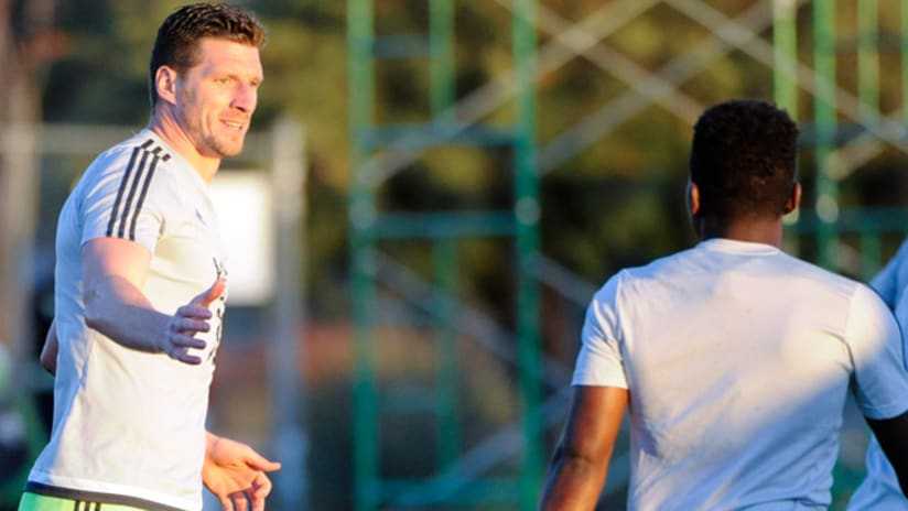 Kenny Cooper celebrates a goal for Seattle Sounders during preseason