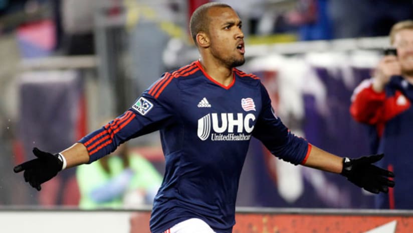 New England's Teal Bunbury celebrates his winner