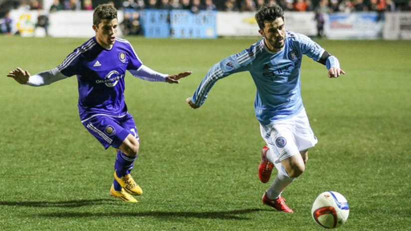 David Villa (New York City FC) is chased by Cristian Higuita (Orlando City SC) in preseason