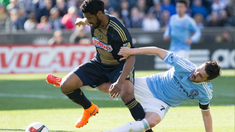 Sheanon Williams (Philadelphia Union) rides a tackle from David Villa (NYCFC)