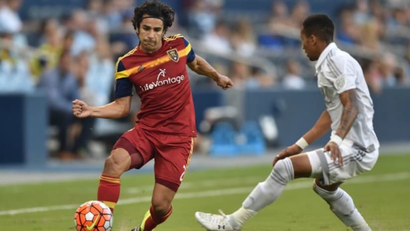 Tony Beltran (Real Salt Lake) takes on Amadou Dia (Sporting Kansas City)