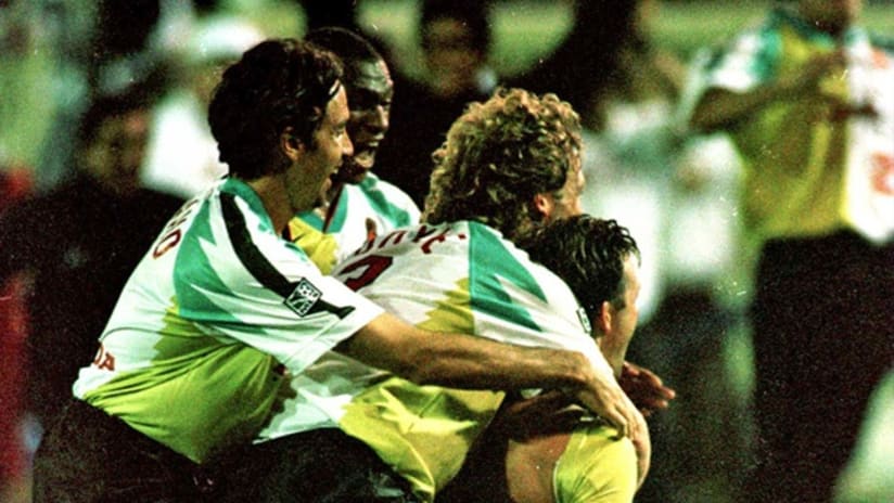 San Jose players celebrate a win in the 1996 inaugural MLS game