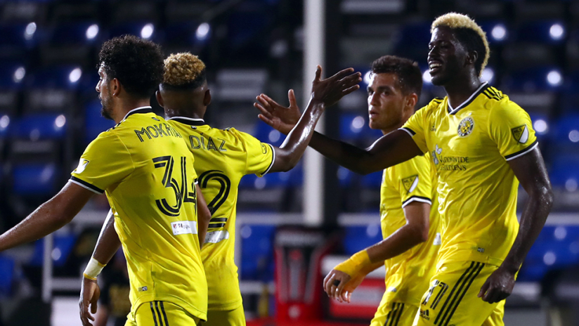 Gyasi Zerdes - Columbus Crew - July 11 - celebrates with teammates