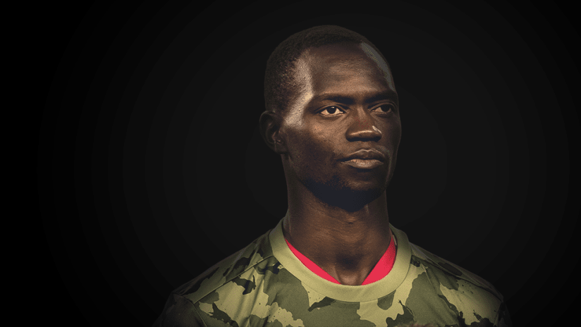 Micheal Azira - portrait against black background - use only for special posts