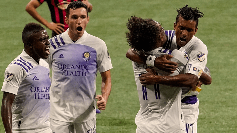 Junior Urso, Nani - Orlando City SC - Hugging