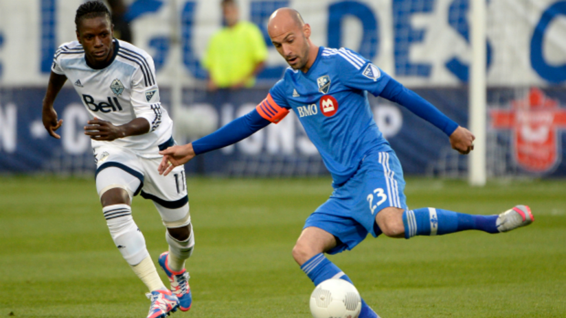 Darren Mattocks (Vancouver Whitecaps) and Laurent Ciman (Montreal Impact) in 2015 Canadian Championship final