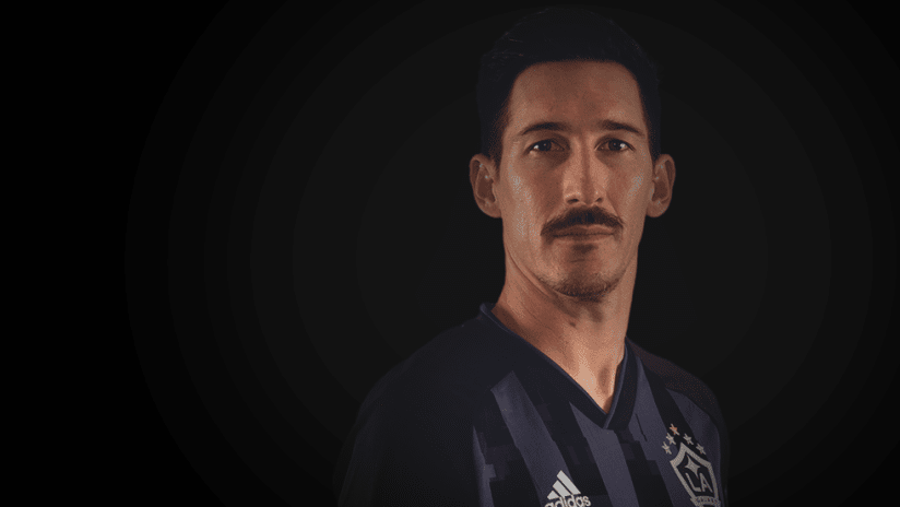 Sacha Kljestan - portrait against black background - use only for special posts