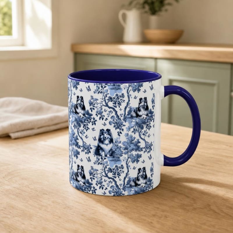 Shetland Sheepdog navy handle toile mug on a breakfast table