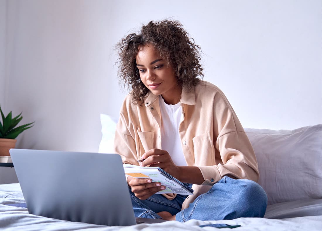 VCE student learning maths online from the comfort of her bed