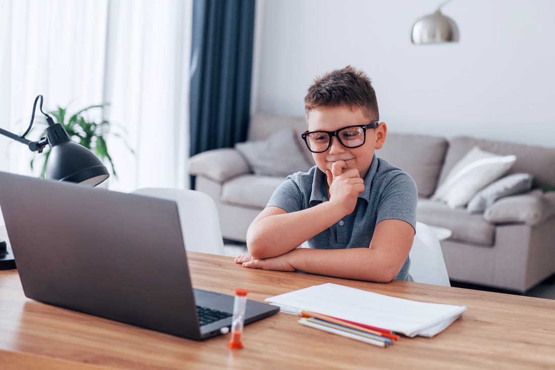 boy-is-having-online-maths-lessons-using-laptop_g1hfhc.jpg