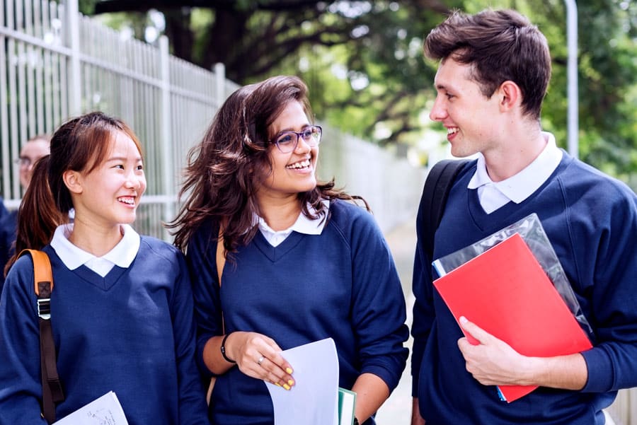 excited high school students celebrating ATAR results