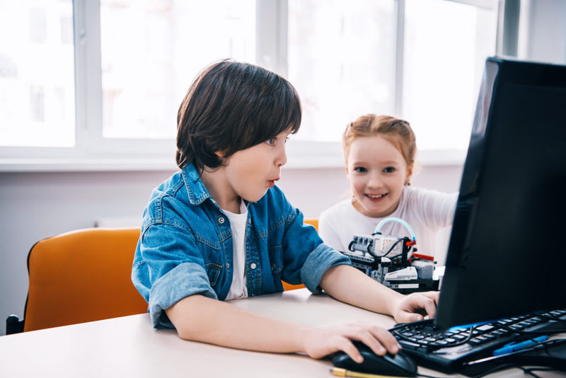 students using technology to discover math concepts