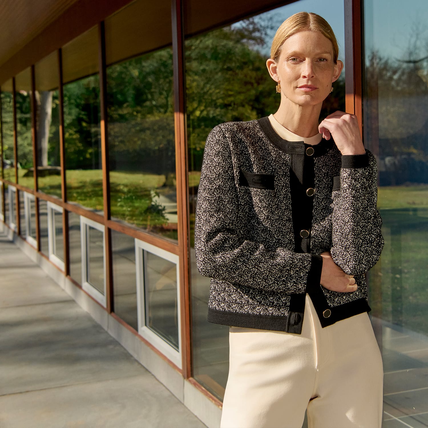 front image of a woman wearing the evangeline jardigan in boucle jardigan