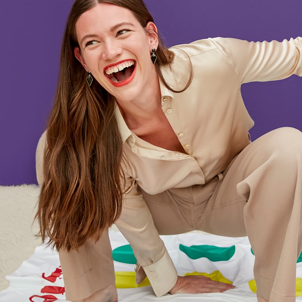 Woman wearing the Tatum in champagne playing Twister